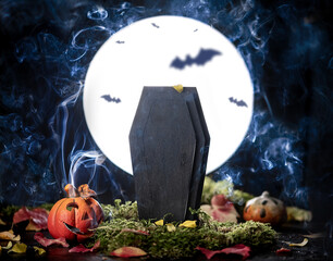 Halloween decoration on dark spooky forest with full moon