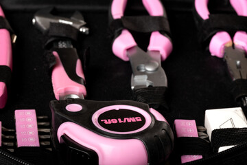 Home master's toolkit with pink handles