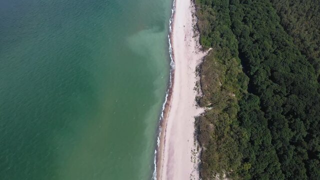 Beautiful aerial drone wide view of Curonian spit, Kurshskaya Kosa National Park, Curonian Lagoon and the Baltic Sea, Kaliningrad Oblast, Russia and Klaipeda County, Lithuania, summer day
