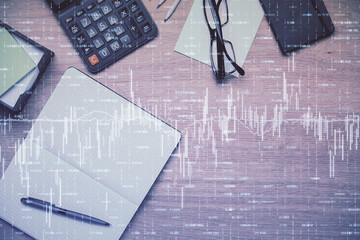 Double exposure of forex graph drawing and work table top veiw. Concept of financial analysis.