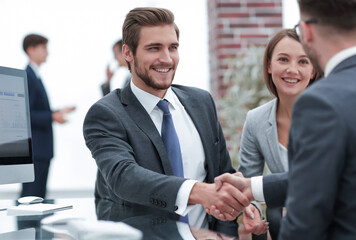 happy man introducing businesswoman to business partners