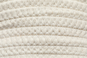 Elegant woman's straw bag as background, closeup