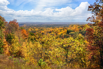 Brown County State Park in Indiana is renowned for it beautiful fall foliage vistas showing autumn...
