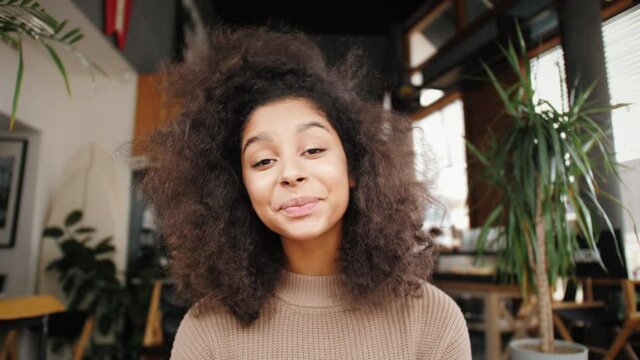 Black woman on video conference call, camera view, video chat, african american female chatting with friends, POV communication during coronavirus pandemic, remote work and learning