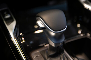 Close-up of automatic gearbox handle in the modern car