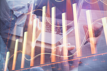 Double exposure of man and woman working together and forex chart hologram. Business concept. Computer background.