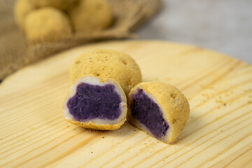 Japanese creative potato shaped dango or dessert with purple sweet potato filling