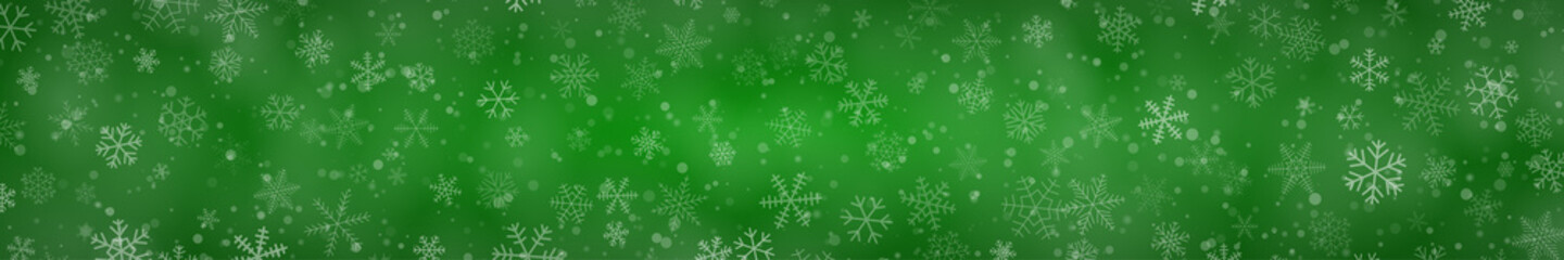 Christmas banner of snowflakes of different shapes, sizes and transparency on green background © Aleksei Solovev