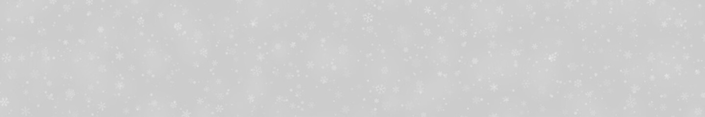 Christmas banner of snowflakes of different shapes, sizes and transparency on gray background
