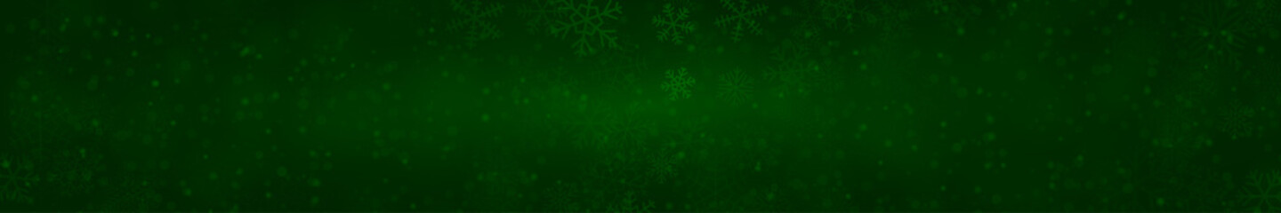 Obraz na płótnie Canvas Christmas banner of snowflakes of different shapes, sizes and transparency on dark green background