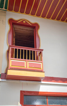 Balconies and windows of red, blue, green, yellow colors in the coffee region in Colombia