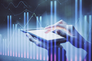 Double exposure of forex chart sketch hologram and woman holding and using a mobile device. Financial market concept.