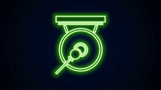 Glowing neon line Gong musical percussion instrument circular metal disc and hammer icon isolated on black background. 4K Video motion graphic animation.