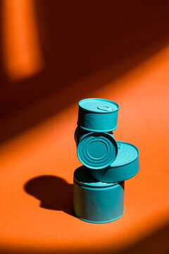 Stack of turquoise preserve cans