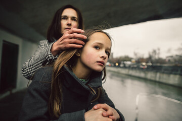 Mother caress daughter's hair