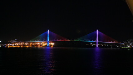 night shot of Korea busan bridge and port from cruise
