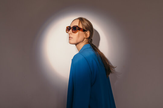 Stylish model under spot of light