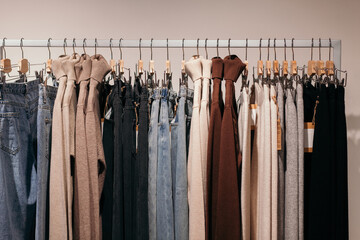 Clothes on hangers in the wardrobe