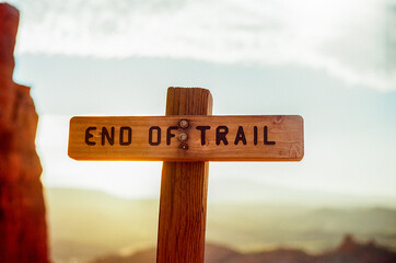 An end of trail sign hiking in the desert