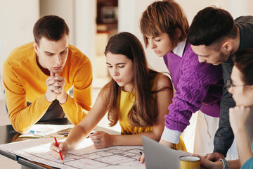 Young architects thinking over project