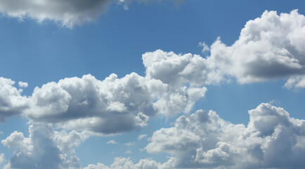 bright cumulus cloud and blue sky