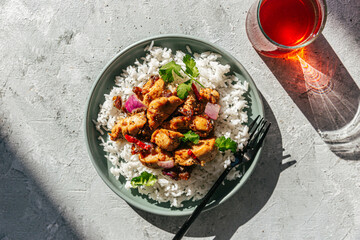 Stir-fry chicken with basmati rice on single plate