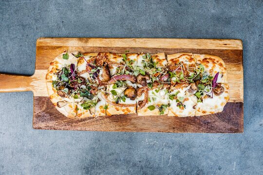 flatbread pizza on a table