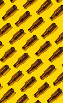 Beer Bottles On Yellow Background