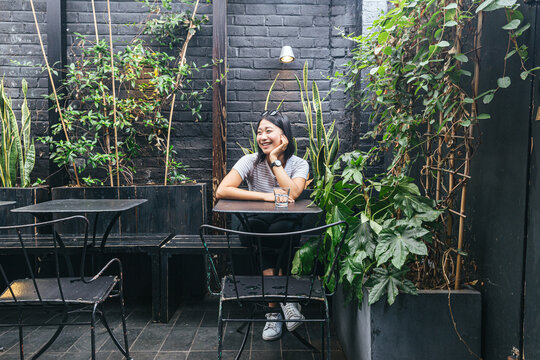 Causal portrait of female sitting in cafe
