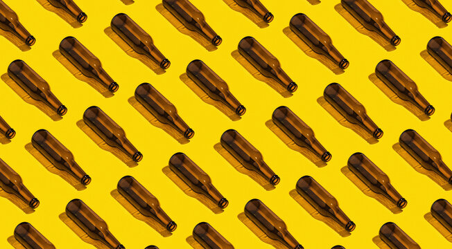 Beer Bottles On Yellow Background