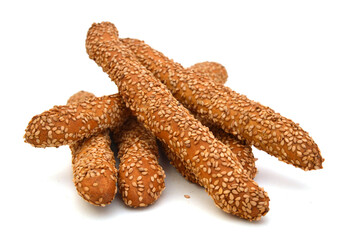 Baking bread with sesame stick isolated on the white background