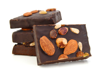 Chocolate with almonds , peanuts on white background