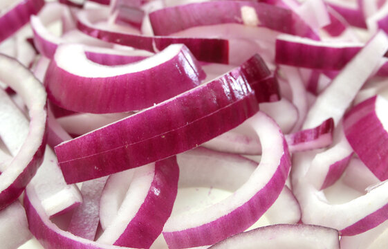 close up of sliced red onion, intended as a background image