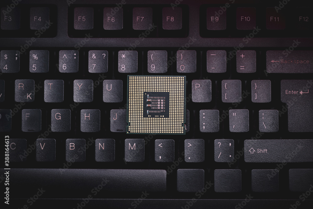 Aufkleber cpu industry concept. central processing unit on a black computer keyboard background. illustrative 