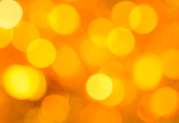 abstract background with bokeh.
Abstract background with lights of gold color, close-up.