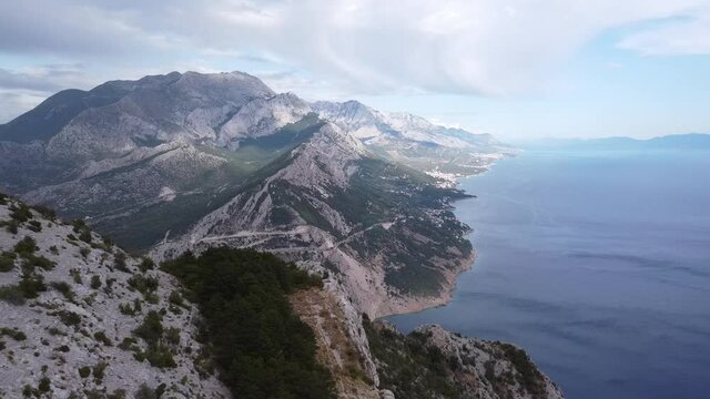 Amazing view above the bay of Vruja and the biokovo mountains in Croatia (Drone)