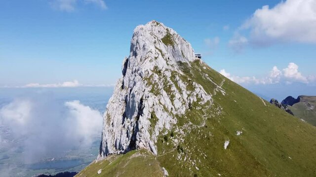Beautiful Stockhorn peak filmed by drone in Switzerland, sunny weather with blue skies ans some clouds