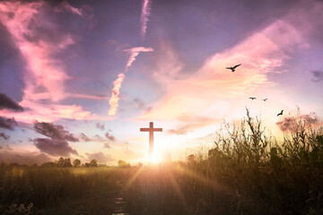 Easter concept: Concept : cross on sunset sky background