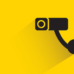 CCTV, security camera with drop shadow on yellow background