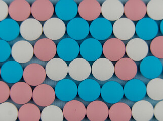 the colorful pills and vitamins. medical background.