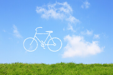 Fototapeta na wymiar 草原と自転車の雲