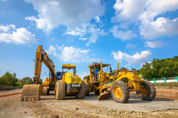 Backhoe, grader and road roller on the ground at site construction. - obrazy, fototapety, plakaty