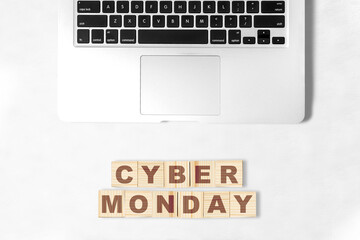 Cyber Monday text on the wooden cube on the desk