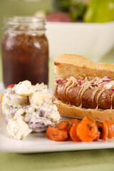 A beautifully prepared, gourmet bratwurst meal.