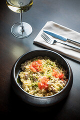 Ptitim with rabbit and white wine