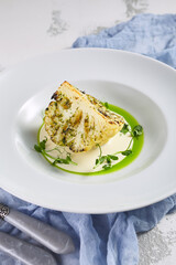 Roasted cauliflower with cream sauce and pesto