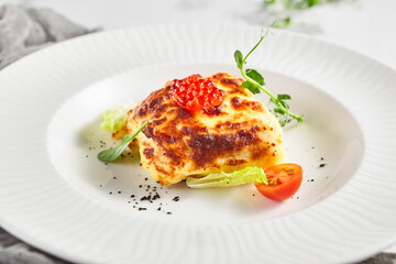 Lasagna with tomato and green leaf