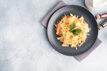 Salad of fresh grated carrots and green radish with sauce Copy space