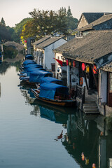 Fototapeta na wymiar The sunrise view of the architectures and rivers in Zhouzhuang, a ancient Chinese village in Jiangsu, China.