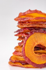 slices of dried plum on a white background. dried fruits. eco. macro.